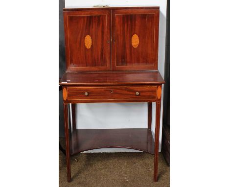 A 19th Century Inlaid Mahogany Writing Table, the two door superstructure over a lower section fitted with a drawer, on squar