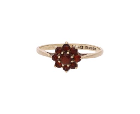 9ct Gold and Garnet Cluster Ring.            HALLMARKS: marked for 9ct Gold              MEASUREMENT: Size M.                