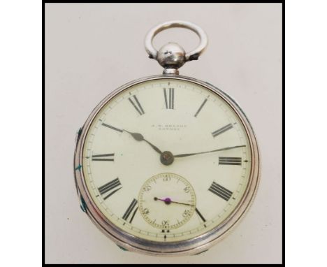 A 19th century Victorian silver hallmarked JW Benson pocket watch having a fusee movement. The white enamel face having a Rom