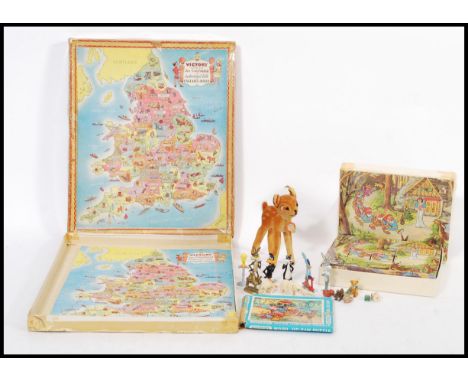 A collection of vintage and retro toys to include a Steiff Bambi stuffed toy, a Victory wooden Jigsaw puzzle, a Disney's Snow