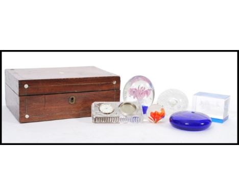 A group of vintage paperweights and studio art glass to include Jersey Glass, Bristol Blue Concorde, Edinburgh Crystal Queen 