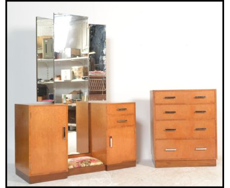 An early 20th Century Art Deco 1920's style birds eye walnut drop centre dressing&nbsp; together with a matching chest of dra