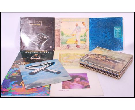 VINYL RECORDS- A fantastic collection of vinyl long play LP records featuring many artists to include Roxy Music, Bryan Ferry