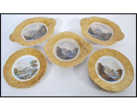 A 19th century F R Pratt Victorian prattware dessert service consisting of seven plates and three tazzas. Gilt painted border