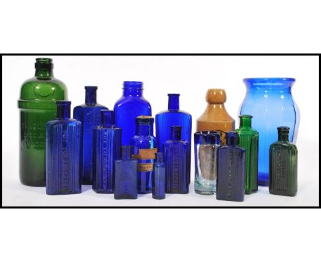 A collection of 19th Century Victorian apothecary / shop bottles to include a green glass tanqueray bottle, blue glass ribbed