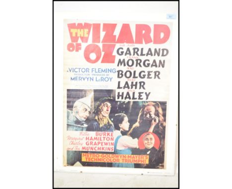 A retro 20th century reproduction advertising point of sale film movie poster for the Wizard Of Oz, printed by IRA Roberts Pu
