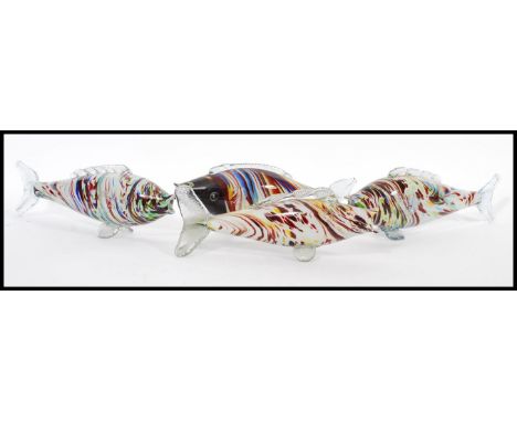 A group of four vintage retro 20th century Murano studio art glass fish perfect for lamp conversion. Tallest measures 11cm hi