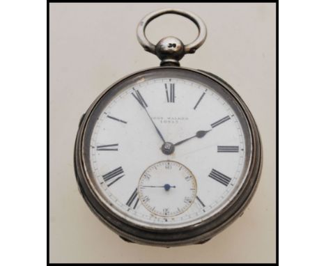 A 19th century Victorian silver hallmarked pocket watch having a fusee movement. The white enamel face having a Roman numeral