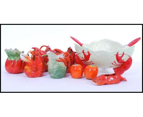 A group of vintage Lobster ware to include a Carlton Red Lobster pattern salad bowl and servers set, lobster creamer jugs in 