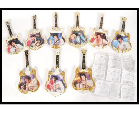 A collection of 21st century Elvis Presley Bradford Exchange guitar form limited edition wall plates limited to 95 firing day