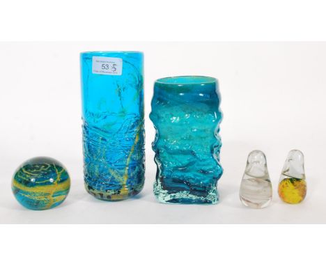 A selection of Mdina glassware to include a green and yellow swirl paperweight, two swirl paperweights in the form of birds, 