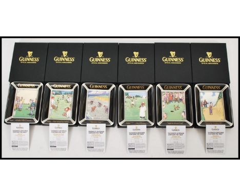 A set of six Guinness advertising ceramic pin trays each featuring Bateman Cartoons. Includes Pebble Beach /250, Jolly Umpire
