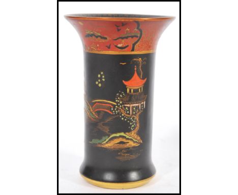 A Carlton Ware Mikado black and rouge pattern vase of cylindrical form along with a Marc Boxer for Carlton Ware Prince Charle