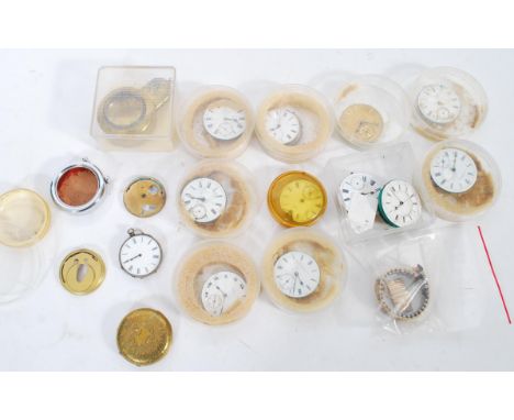 A collection of vintage late Victorian and early 20th century pocket watch movements most having white enamel faces, some wit