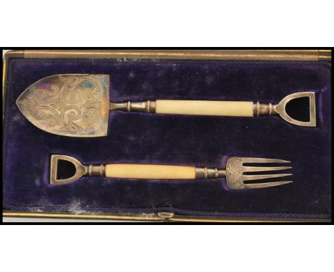 A fantastic 19th century Victorian silver plate serving set in the form of a novelty miniature gardeners spade and fork. Silv