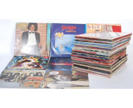 VINYL RECORDS - A large collection of vinyl records, both LP's and 12" records predominantly dating to the 80's and 90's, var