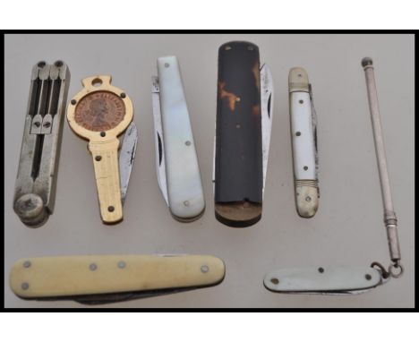 A collection of vintage 20th Century folding knives to include tortoiseshell, mother of pearl examples, a silver hallmarked t