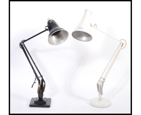 Two vintage retro 20th century industrial desk lamps comprising of a&nbsp;white Herbert Terry anglepoise lamp with circular b