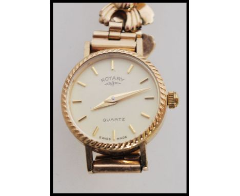 A vintage 1950's ladies Rotary Quartz cocktail watch having a round face with faceted hands and batons markings to the chapte