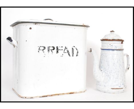 A vintage retro 20th century enamel bread bin along with a French enamel coffee pot. The bread bin having a white enamel grou