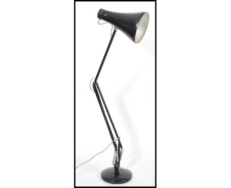 A vintage retro mid 20th century Herbert Terry industrial anglepoise desk lamp raised on circular base with adjustable neck a