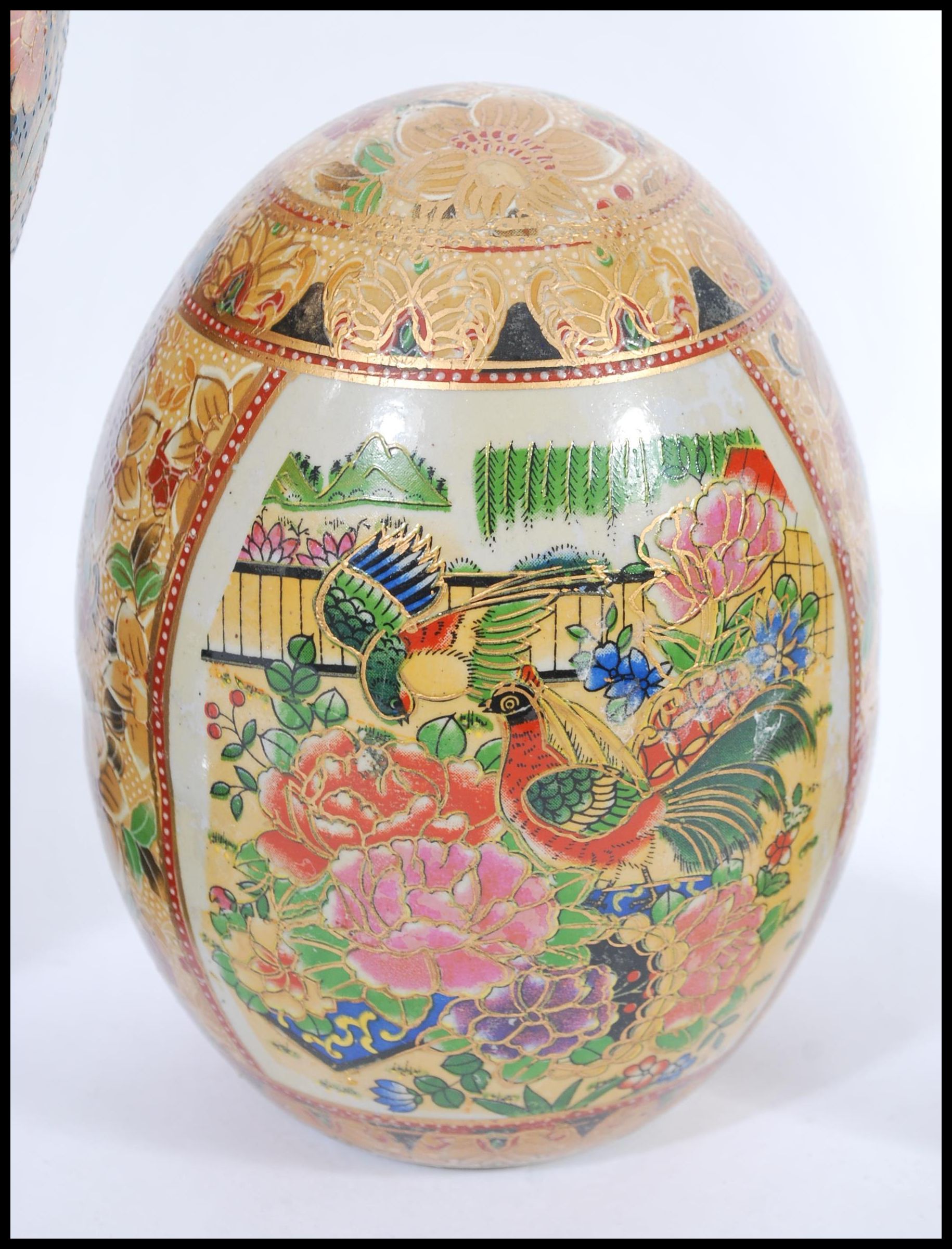 A group of three vintage 20th century Japanese ceramic eggs to include