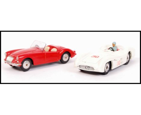 Two vintage scale diecast model vehicles to include; Corgi Toys MGA in red and Dinky Toys 237 Mercedes Benz . Both very good 