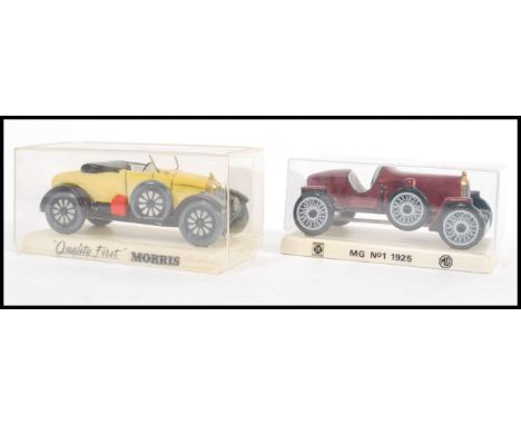 Two Carlton ware china cars of advertising interest to include a yellow 'bull nose Morris' reading "Quality First Morris" and