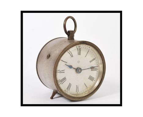 A 19th century American barrel clock stamped for 1878. The white enamel face having a Roman numeral chapter ring with faceted