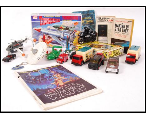 A collection of TV and film related scale diecast model vehicles and model kits to include; 2 x IMAI Thunderbirds model kits 