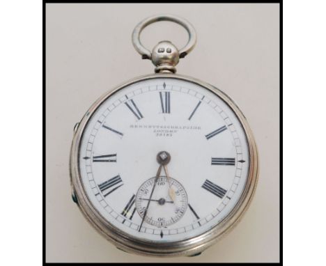 A 19th century Victorian silver hallmarked pocket watch having a fusee movement. The white enamel face having a Roman numeral