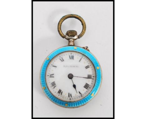 A 19th century silver and enamel small pocket fob watch having a beautiful blue enamel and gilt case. Dial signed Balmoral. T