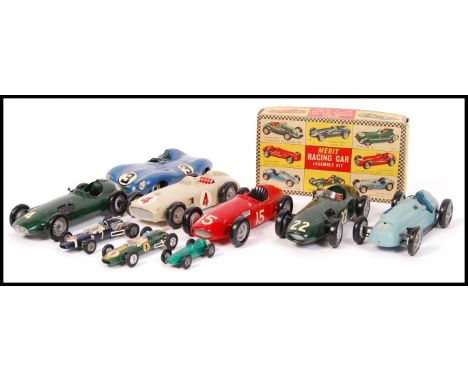 A collection of 7 x Merit made plastic model racing cars to include; Mercedez Benz , Serati , 'D' Type Jaguar , boxed Cooper 