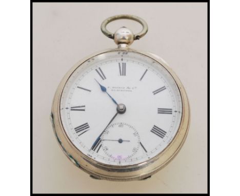 A 19th century Victorian silver hallmarked pocket watch having a fusee movement. The white enamel face having a Roman numeral