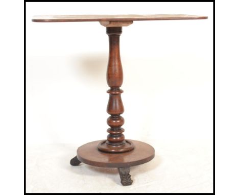 A 19th century Victorian mahogany side occasional table raised on a tripod base with turned column and panel top.&nbsp;Measur