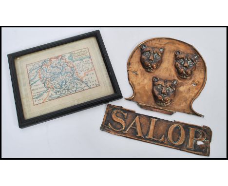 An early 20th Century embossed copper sign for Shropshire reading Salop with three lions above along with a small framed and 
