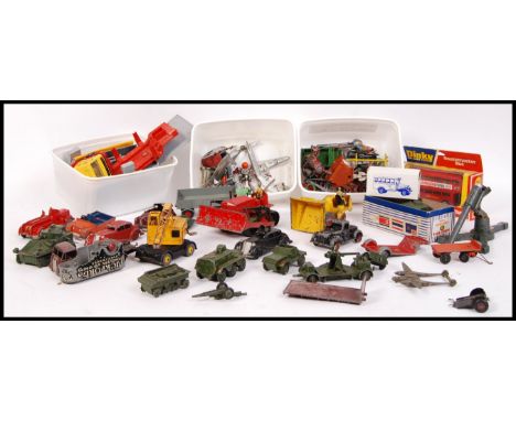 A collection of assorted vintage and early diecast largely Dinky but also some Crescent and Timpo included with some lead fig