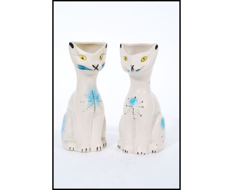 A pair of unusual retro 1960's Arthur Wood 'Smoky' ceramic vases in the form of cats with hand painted decoration including y