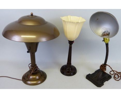 An Art Deco rewired bronzed desklamp, a rewired adjustable Leviton table lamp with cast iron base, together with a Bakelite l