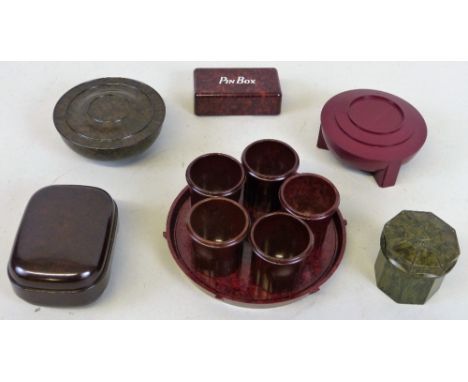 A quantity of Bakelite to include; a pin box, a vintage Art Deco burgundy Dubarry shaving soap dish, no. 817400, a Boots shav