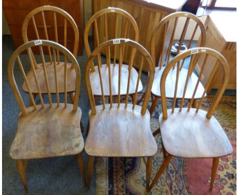 A set of six Ercol stick back kitchen chair with elm seats