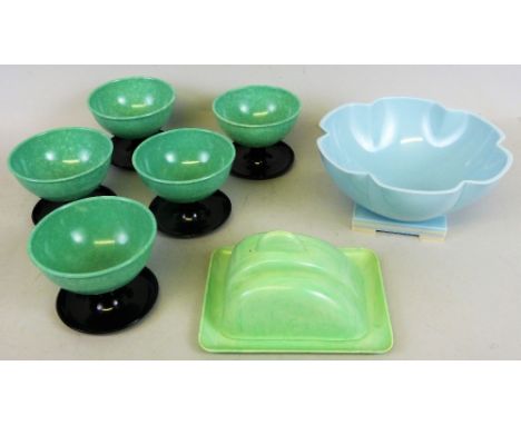 A quantity of Bakelite to include; a cheese dish, a light blue pedestal bowl, together with five dessert dishes (7)