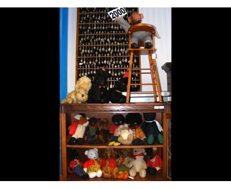 A vintage chimp hand puppet presented in highchair, together with a collection of vintage stuffed toys - on three levels 