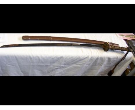 A Japanese sword with pierced tsuba and metal scabbard - 95cm long CONDITION REPORTBy our judgement, condition of lot is good