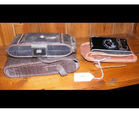 A vest pocket Autographic Kodak with collapsible bellows c.1914 - popular with soldiers of WWI alongside vintage Italian I.C.