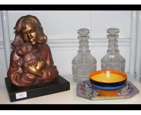 A female figure of girl with dog signed Heath, together with a pair of early 19th century stepped decanters, Carlton Ware dis