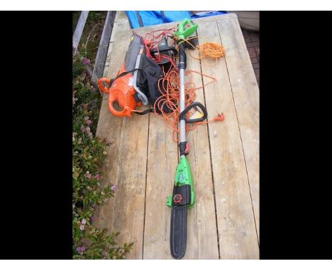 A long armed electric lopper together with blower and hedge cutter