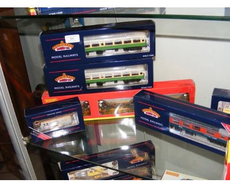 Four boxed Bachmann railway items, together with a Hornby rolling stock set