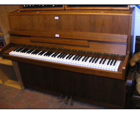 A Zimmerman upright piano in light wood case - 3 pedals 
