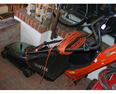 A Hayter mains electric rotary lawn mower with box